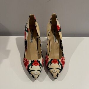 Karl Lagerfeld Paris Royale Dress Pumps with a floral print